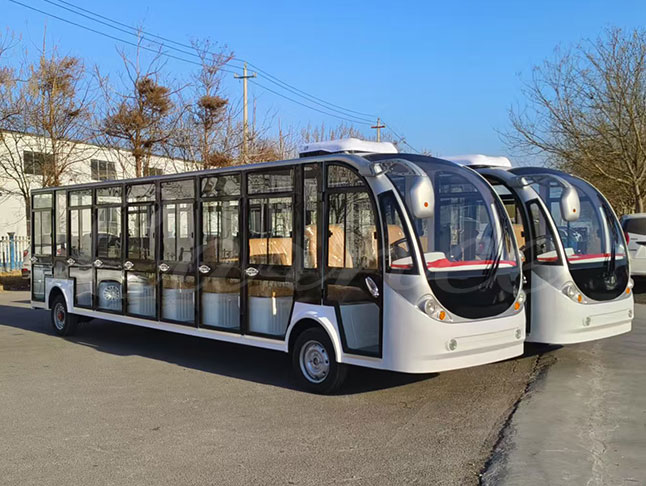 23-seater closed electric shuttle bus front-side view parked outdoors