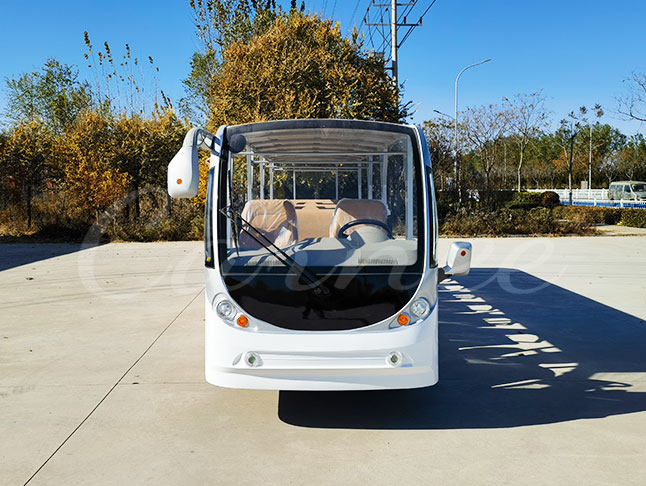 Front view of 23 seater electric sightseeing bus in open design with clear roof