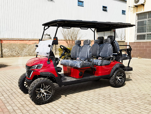 Red 6 seater electric golf buggy parked outdoors for commercial use