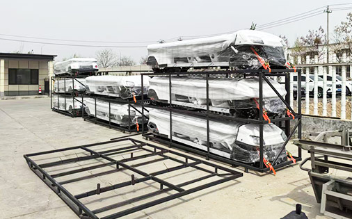 Golf carts shipping & packaged and secured on metal frames, wrapped in protective plastic for safe transport.