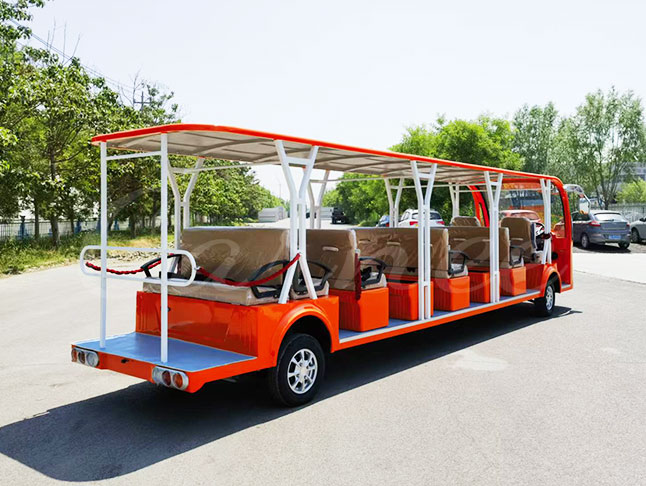 Rear side view of open-air 23 passenger electric sightseeing shuttle bus in orange color