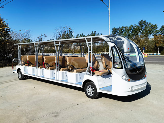 White open electric sightseeing bus with 23 seats, front-left angle