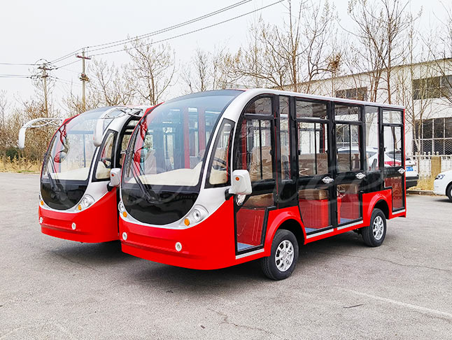 Two red 11-seater closed electric sightseeing buses with modern design, perfect for tourist attractions and parks