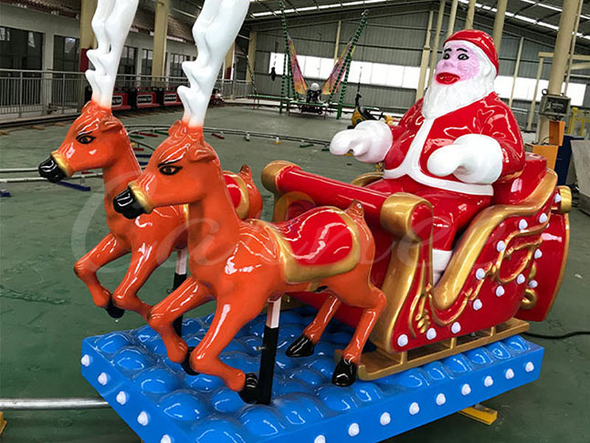 Christmas Track Train Ride Featuring Santa Claus and Reindeer – Family-Friendly Christmas Amusement Ride with Bright Colors and Holiday Spirit