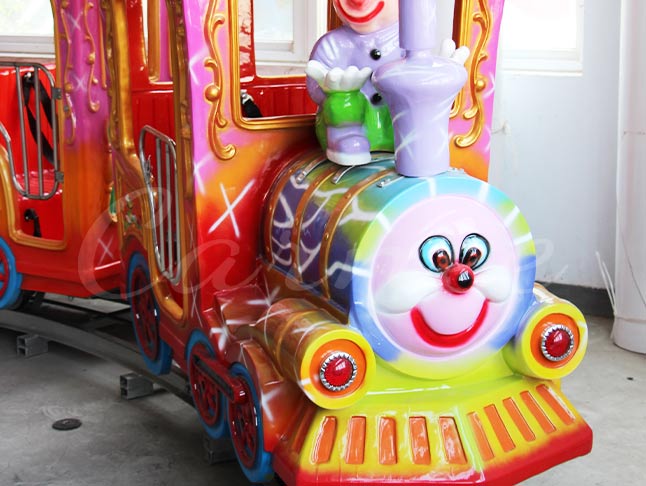Children's amusement park clown-themed ride, with colorful details and playful design.