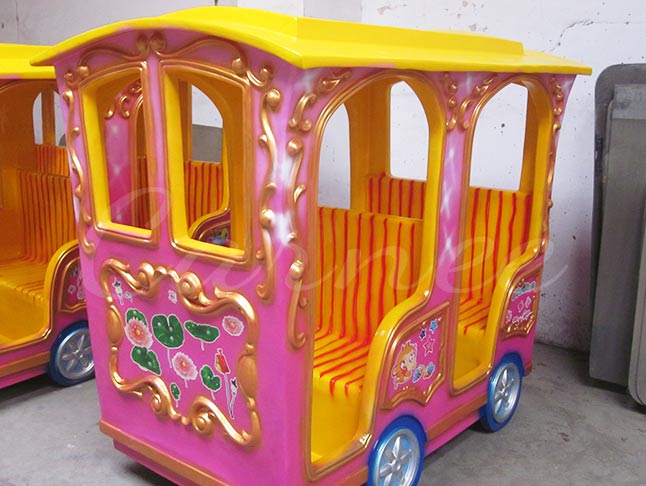 A fun and safe elephant-themed track train ride for kids at a family entertainment center.