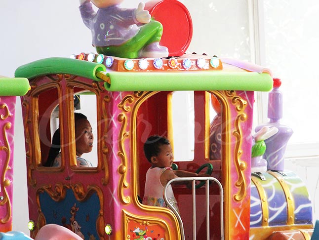 Fun clown train ride designed for kids, with cheerful and vibrant colors to delight children.