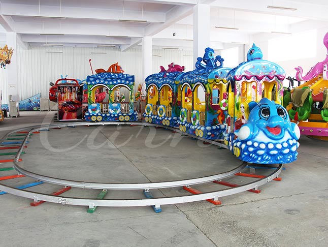 Ocean theme track train ride with colorful fish and ocean decorations for kids amusement park