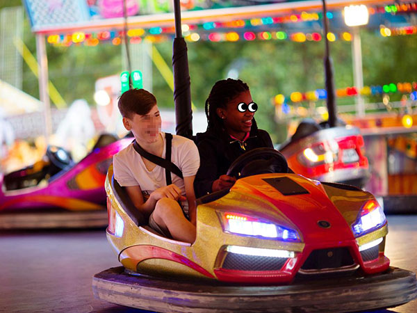 Safe and fun bumper car experience for adults with safety gear.