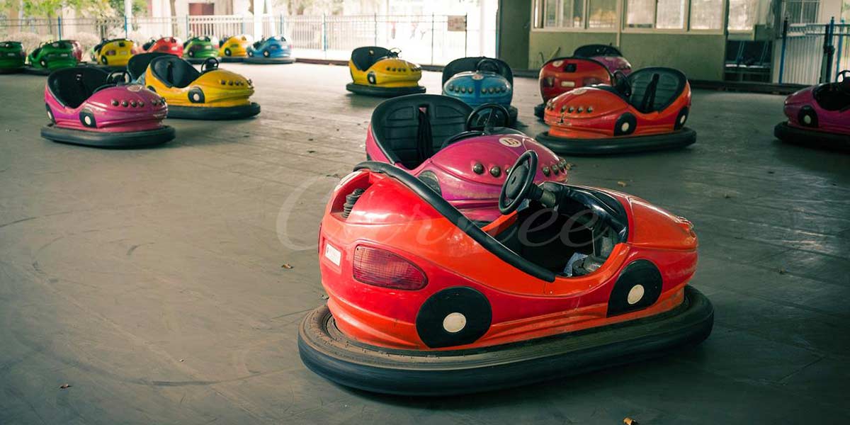 Colorful bumper cars at amusement park highlighting safety features.