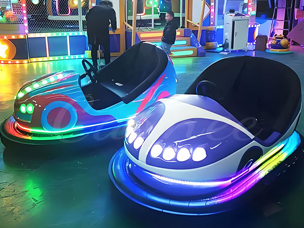 Modern LED electric bumper cars with vibrant lighting, ready for indoor amusement parks.