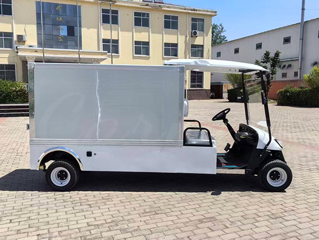 Electric food golf cart with cargo box, ideal for resort and event catering with easy access to food and beverage supplies.