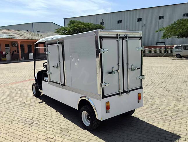 Rear view of electric food delivery catering golf cart, showcasing spacious cargo box for efficient service at resorts and events.