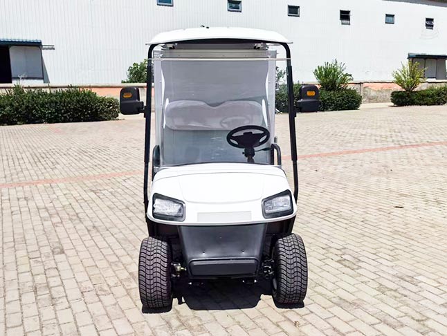 Front view of electric golf cart for food service, equipped with a clear windshield and ergonomic seating for efficient catering.